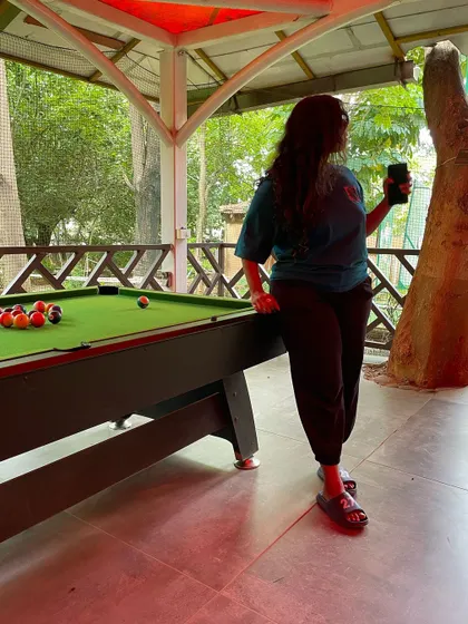 Relaxing by the pool table is a great way to unwind. Our games area is designed to be a social hub for guests.