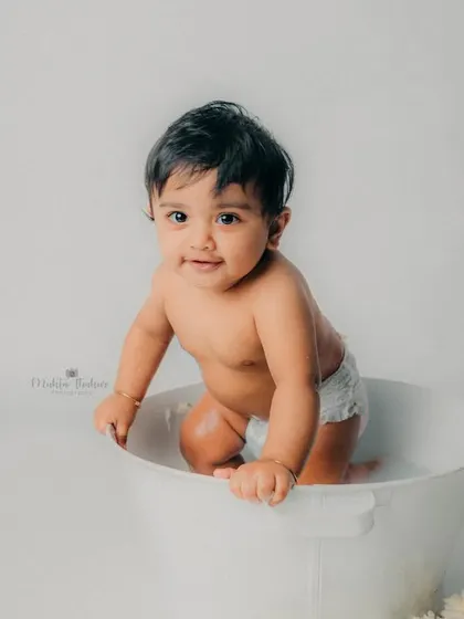 Trying to make a great escape. These candid moments show off your baby's playful personality.