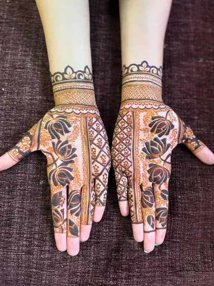 A bold design featuring large lotus flowers. The use of dark filled areas makes the floral patterns stand out beautifully.