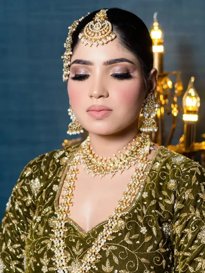 A close-up of the eyes in a soft glam bridal look. The eyeshadow is blended to perfection to create a dreamy, ethereal effect.