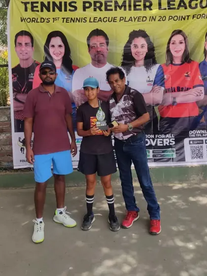 Another champion from our TPL-ITA tournament proudly displays his trophy. We focus on creating a positive and celebratory atmosphere to conclude every competition we host.