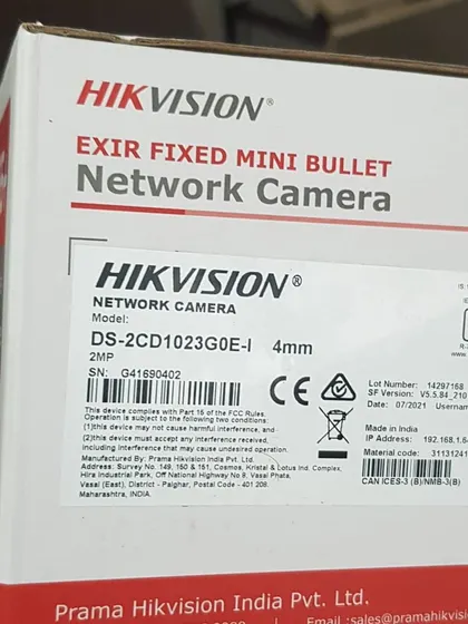 The label on a Hikvision 2MP network camera box, showing model number, serial number, and "Made in India" origin.