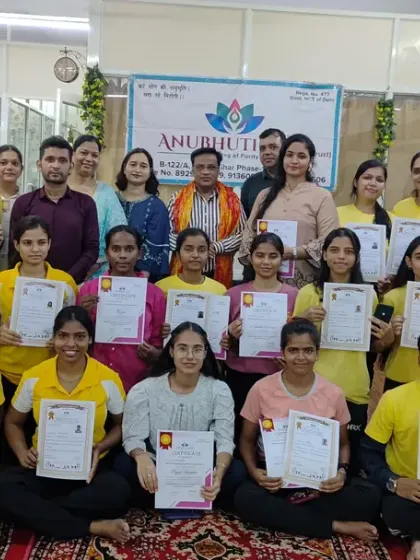 Certification day is always a moment of pride. Here is another group of newly certified yoga trainers, holding their government-recognized certificates after completing their training at Anubhuti Yog.
