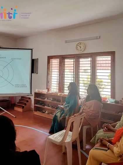 Another angle of the presentation at Smiti Montessori, where we discussed how to tailor teaching approaches to different developmental stages.