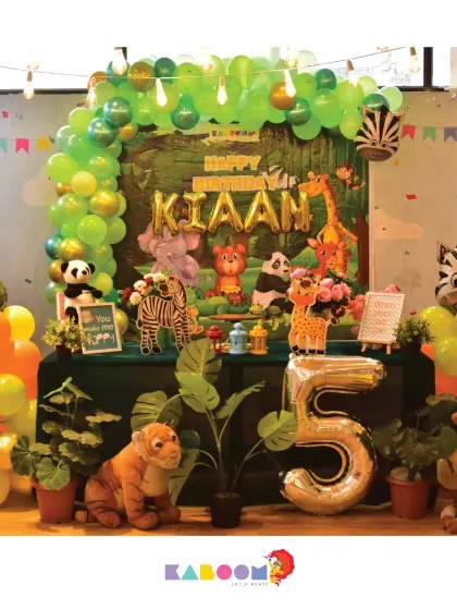 Another take on our popular jungle theme, with a vibrant green balloon arch, friendly animal characters, and fun plant details to set the scene.
