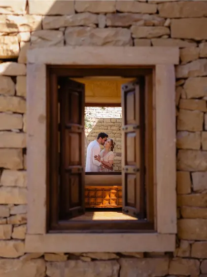 A quiet moment captured through a window at Suryagarh. This framed portrait of Priyangi and Kishan feels intimate and timeless, like a secret glimpse into their love story.
