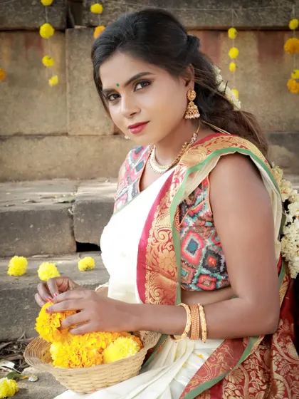 The beauty of simplicity. This traditional look for a festive shoot highlights a fresh, even skin tone and defined features, perfect for celebrating cultural events like Onam.