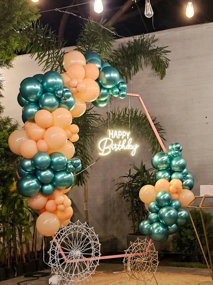 Another view of the hexagonal arch, this time incorporating a decorative bicycle prop for a whimsical touch.