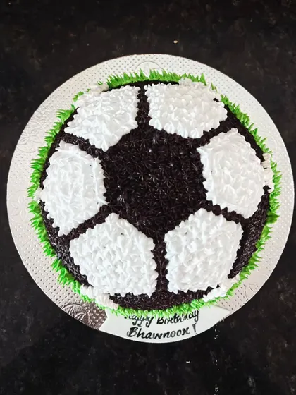 A classic football cake made with rich Dutch truffle, perfect for a soccer lover's birthday.