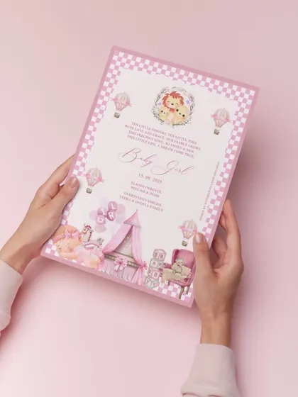 A heartwarming birth announcement for a baby girl. This printed card is filled with pastel charm, from the pink checkered border to the delicate illustrations of a nursery, celebrating a beautiful new beginning.
