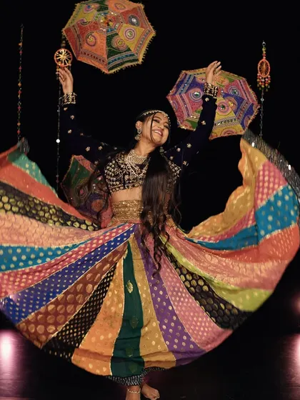 A moment of pure joy captured during my Navratri shoot. The twirl of the lehenga is one of the best parts of Garba!