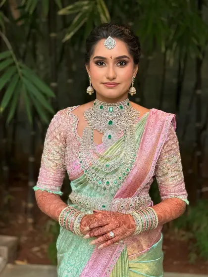 Manasa ready for her big day. The complete look is harmonious, with every element from makeup to jewelry carefully considered.