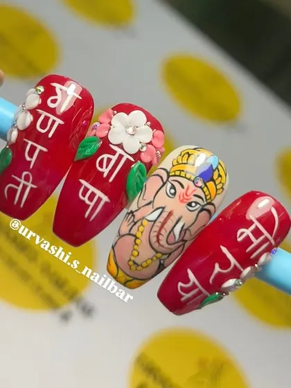I love bringing festive ideas to life, like this hand-painted Ganpati Bappa Morya set. It's a beautiful way to celebrate, with detailed artwork of Ganesha, Devanagari script, and floral accents, all on a vibrant red base.