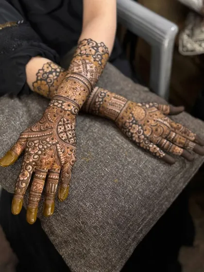 This is a detailed view of my intricate bridal henna work. Each design is unique, combining traditional patterns like paisleys and mandalas with fine-line fillers to create a stunning, full-coverage look for your special day.