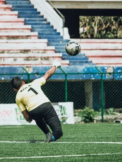 This is our former captain and goalkeeper, Akash Kola, making a spectacular save. He joined us with little experience and grew into a leader, eventually earning his AIFF 'D' Coaching Certificate and pursuing higher education in the UK.