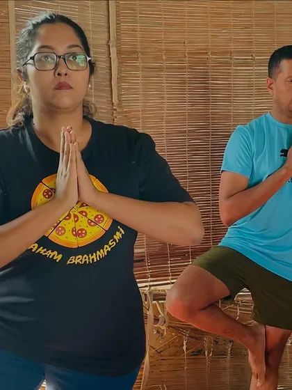 Business owners from BNI Bangalore practicing Tree Pose (Vrikshasana). This balancing posture not only improves physical stability but also enhances mental focus and concentration.