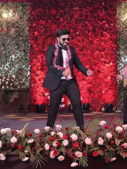 The groom and his friends bringing the swag with sunglasses and coordinated moves. This groomsmen performance was one of the coolest parts of the sangeet.