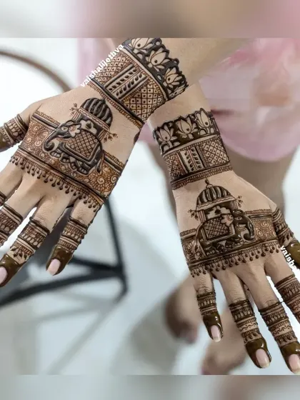A striking back-hand design with royal elephants. The placement on the back of the palm makes a bold statement, perfect for guests or parties.