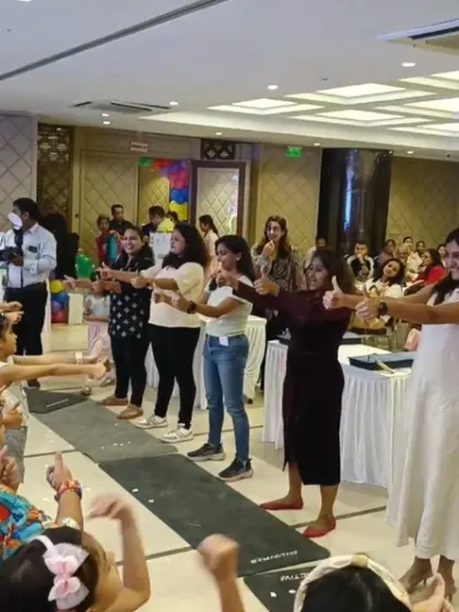 Thumbs up all around. Kids and parents participate together in a fun, interactive game, showing that our parties are engaging for the whole family.