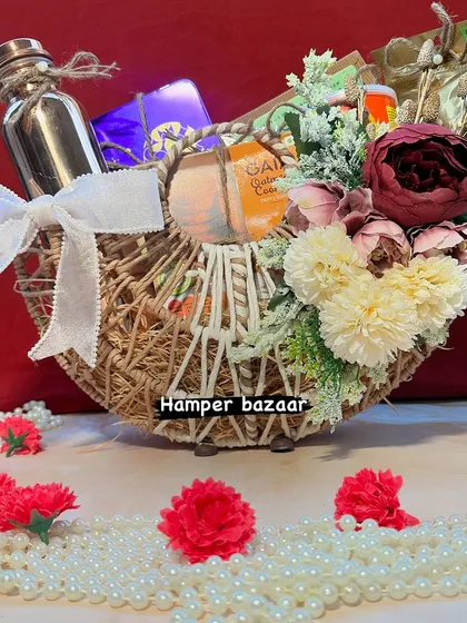This beautiful jute basket hamper is filled with a mix of goodies and decorated with artificial flowers. It’s a premium option for those looking to give a luxurious and memorable Diwali gift.