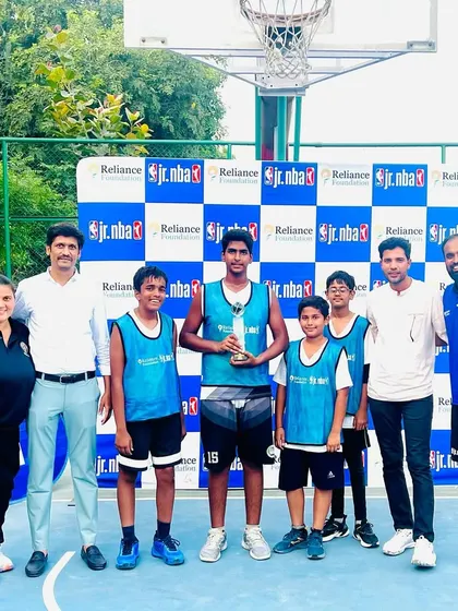 The winning team and coaches at the Jr. NBA Delhi NCR Tournament. This victory was earned through months of dedicated practice and a commitment to teamwork.