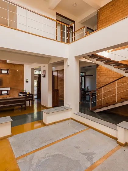 Additional views showcasing the variety of interior spaces we design, from living rooms and bedrooms to staircases and quiet corners, all united by our philosophy of sustainable, soulful design.