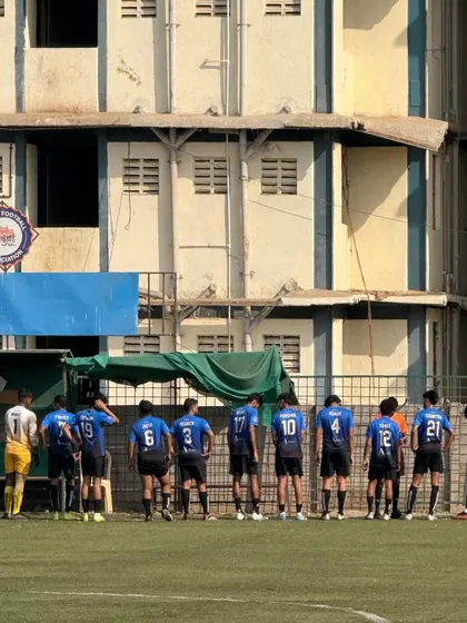 The team lines up before a First Division match, ready to represent the academy.