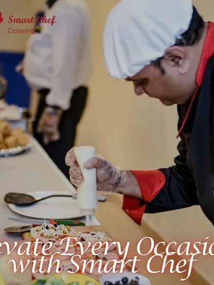 Here is one of our chefs in action, adding the final touches to a dish. We take pride in our presentation and finesse to elevate every occasion.
