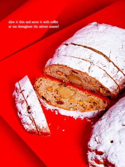 My Stollen is a traditional German Christmas bread. It's filled with nuts, spices, and dried fruit, coated in butter, and dusted with powdered sugar.