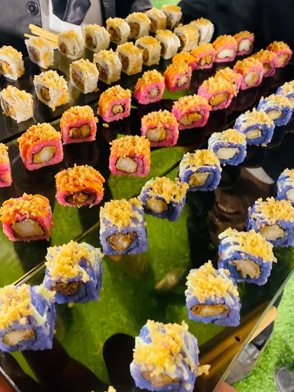 A tray of assorted sushi rolls, showcasing the different colors and textures I offer.