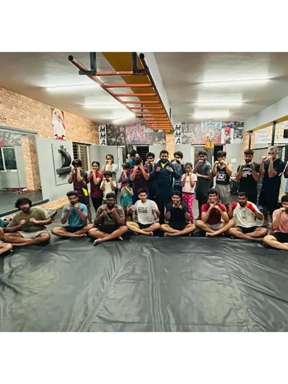 The team posing together after a session. We train together, we grow together.