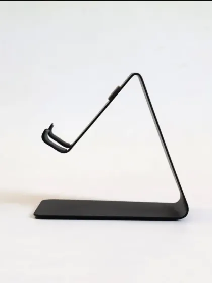 The side profile of the phone stand shows its ergonomic angle, designed for optimal screen viewing. It's a simple, effective, and brandable corporate gift.