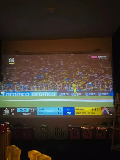 Another view of our IPL screening setup. The big screen and party decorations make for an ultimate match day celebration.