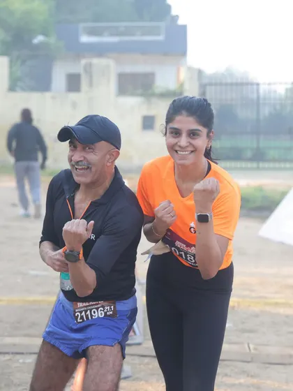 The coach with a happy finisher at the Aravali Trail Run. I am proud of every single one of my runners.
