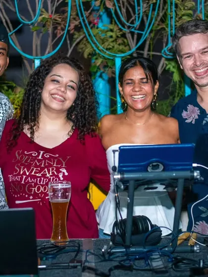 A snapshot with friends and our guest DJ. We love welcoming artists from other cities to share their talent with our community.