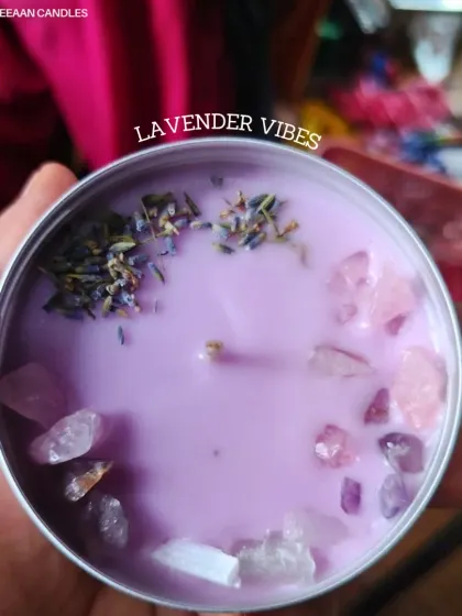 This is my lavender vibes candle, your perfect calming companion. I infuse it with real amethyst crystals and dried lavender to help melt away the stress of the day.