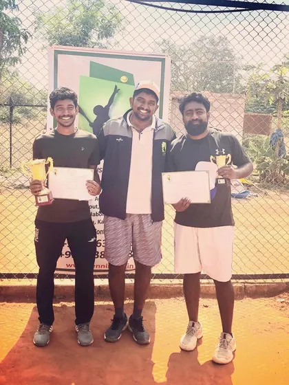 The winner and runner-up of the Tennis360 Men's Open Tour proudly display their trophies and certificates.