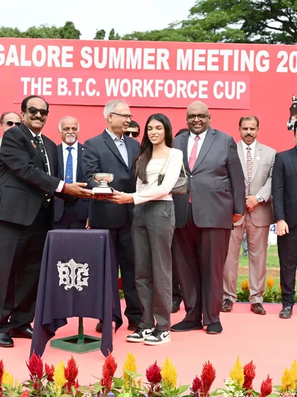 Celebrating the victory of Inspire in The B.T.C. Workforce Cup, with the trophy presented by former Chairman Mr. Y. Jagannath.
