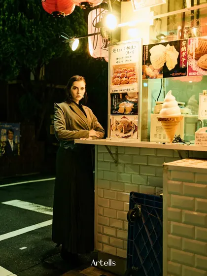 Another shot from our late-night Tokyo shoot. I used the light from this food stall to illuminate the model, creating a warm, isolated glow in the dark street.