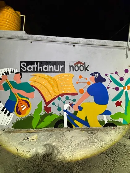 The finished mural for Sathanur Nook, a collaboration with Project Defy. This piece celebrates the spirit of the community, blending themes of music, knowledge, and sustainable energy.
