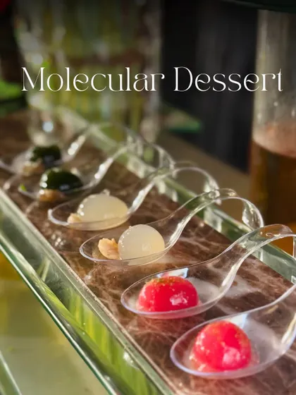 A lineup of my molecular desserts, showcasing the different colors and flavors I can create. These liquid spheres are always a conversation starter.