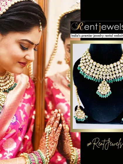 The perfect bridal portrait. This bride looks serene and beautiful in a classic Kundan and emerald green necklace set, complete with a matching pendant and earrings.