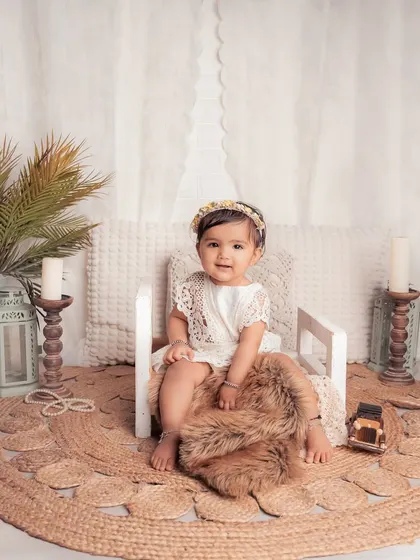 Another beautiful shot of this little darling in our boho corner. The natural light and earthy elements like the jute rug and palm plant create a warm and inviting feel.