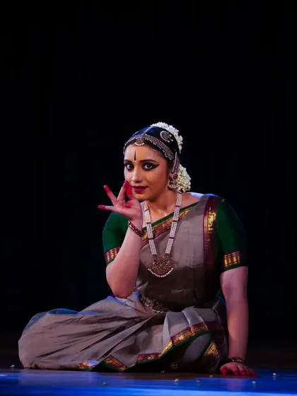 Meera Sreenarayanan in a seated abhinaya pose, her expression conveying the subtle emotions of the piece.