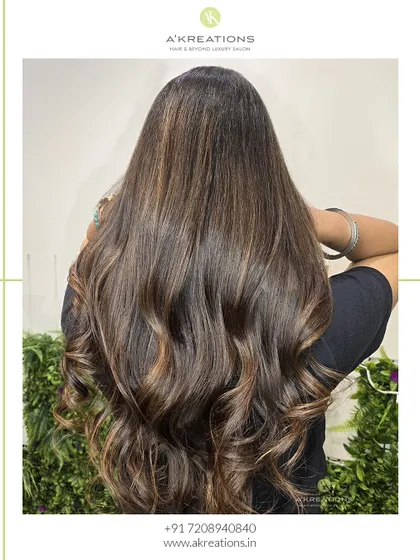 A different angle of our caramel highlights, showing the depth and dimension of the color in these beautiful, flowing waves.