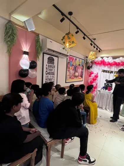 Performing for a group of kids at a birthday party held in a Bangalore cafe. My act is flexible and can be set up in various venues, ensuring great entertainment wherever you choose to celebrate.