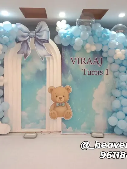An alternate view of the teddy bear and hot air balloon setup, showing a different arrangement with the teddy bear cutout placed on the backdrop. This highlights the flexibility of the decor elements.