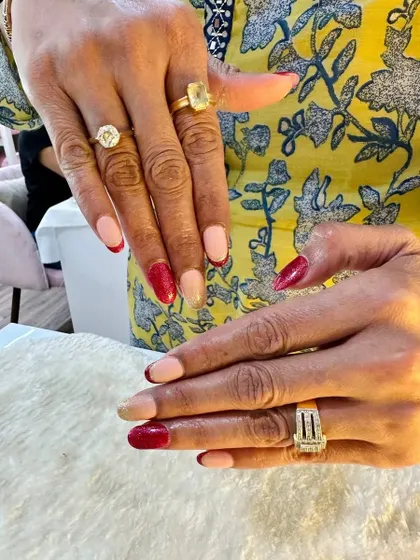A full view of the red and gold shimmer French twist, a perfect choice for the festive season or a glamorous bride.