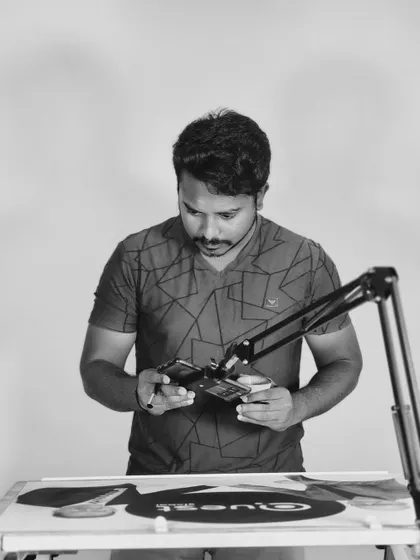 A behind-the-scenes shot of me filming the creation of the portrait.