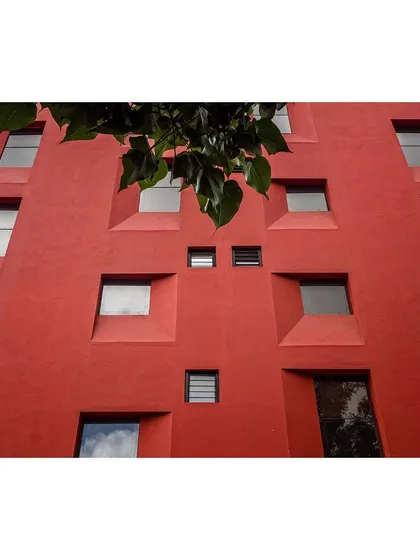 A close-up view of the fenestration, showing how different window sizes are composed to create a dynamic and seemingly random pattern that is, in fact, highly logical.